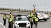 Canadian police check a car next to the red zone security perimeter around the Manoir Richelieu ahead of G7 Summit in La Malbaie, Canada, June 5, 2018. 
