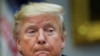 President Donald Trump listens during a small business round-table at the White House in Washington, Dec. 6, 2019. The White House said Friday that Trump would not mount a defense in the impeachment proceedings against him.