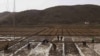 People work in a field outside of Kaesong, North Korea, April 17, 2011. North Korea's perennial food shortage reached a crisis point in 2011, aid workers say, because of torrential rains, the coldest winter in 60 years and rising food prices.