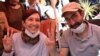 Nuriye Gulmen, a literature professor, and Semih Ozakca, a primary school teacher, who have been on hunger strike after they both lost their jobs in a crackdown following a failed July coup against President Tayyip Erdogan, take part in a protest against a government purge in Ankara, Turkey, May 11, 2017. 
