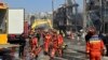 Firefighters work the scene of an explosion in Sanhe city in northern China’s Hebei province on March 13, 2024. Rescuers were responding to a suspected gas leak explosion Wednesday in a building in northern China, authorities said. 