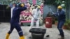 How do you deal with stress? In Nigeria, swinging a sledgehammer in a 'rage room' helps
