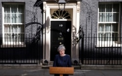 Britain's Prime Minister Theresa May speaks to the media outside her official residence of 10 Downing Street in London, April 18, 2017.