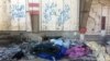 Militants’ Bodies Still Rot in Old Mosul Amid Rebuilding Efforts