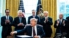 From left, Treasury Secretary Steven Mnuchin, Senate Majority Leader Mitch McConnell, House Minority Leader Kevin McCarthy, Vice President Mike Pence and Rep. Kevin Brady applaud President Donald Trump on March 27, 2020..