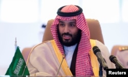 FILE - Saudi Crown Prince Mohammed bin Salman speaks during the meeting of Islamic Military Counter Terrorism Coalition defence ministers in Riyadh, Nov. 26, 2017. (Saudi Royal Court/Handout via Reuters)