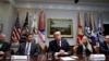 President Donald Trump, center, at the during a healthcare roundtable in the Roosevelt Room of the White House, Wednesday, Jan. 23, 2019, in Washington.