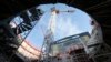 The Tokamak complex is pictured at the construction site of the ITER ( the International Thermonuclear Experimental Reactor), in the CEN of Cadarache, in Saint-Paul-Lez-Durance, southern France, Wednesday, Dec. 13, 2017.