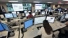 FILE - The National Cybersecurity & Communications Integration Center (NCCIC) prepares for the Cyber Storm III exercise at its operations center in Arlington, Va., Sept 2010. 