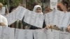FILE - Bosnian Muslim women from Visegrad hold a peaceful protest of the U.N. war crimes tribunal's failure to include counts of rape in indictments against Bosnian Serb cousins Milan and Sredoje Lukic, Sarajevo, July 18, 2008.