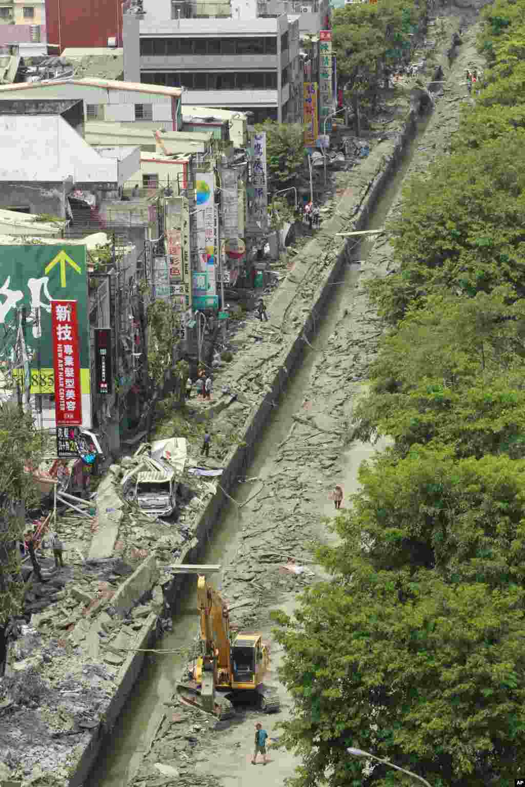 A rooftop view shows a destroyed street from a massive gas explosion in Kaohsiung, Taiwan, Aug. 1, 2014. 