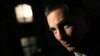 Corsica executive council head Gilles Simeoni answers reporters' questions after a meeting with France's then-prime minister, Manuel Valls, at the Hotel Matignon, in Paris, Jan. 18, 2016.