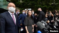 華為公司首席財務官孟晚舟9月24號在加拿大溫哥華一家法院作出裁決後離開法院。