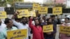 Supporters of the Aam Aadmi Party, or Common Man's Party, shout outside the office of India's ruling Bharatiya Janata Party in New Delhi, India, March 22, 2024. Anti-corruption crusader and AAP leader Arvind Kejriwal was arrested Thursday by the federal investigative agency.