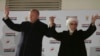 Turkey's President and ruling Justice and Development Party, or AKP, leader Recep Tayyip Erdogan, left, and his wife Emine, greet supporters after the results of the local elections were announced in Ankara, Turkey, early Monday, April 1, 2019.