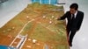 Dawei Development Company's Managing Director Somjet Thinaphong discusses model of the economic zone, Bangkok Sept. 19, 2012.