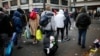 Migrants as they transfer to reception centers across the country during the dismantlement of makeshift camps, Stalingrad metro station, Paris, France, Nov. 4, 2016.