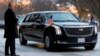 A presidential limo known as "The Beast" carrying President Donald Trump and first lady Melania Trump arrives outside Blair House across the street from the White House in Washington, Dec. 4, 2018.