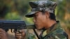  Kachin soldier mans a frontline position, facing off against Myanmar government troops about 15 kilometers (9 miles) from the headquarters of the Kachin Independence Organization, in Laiza, Feb 13, 2012.
