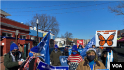 Beneficiarios del TPS y sus familiares marcharon en Washington D.C. para pedir al gobierno de Joe Biden un solución permanente a su situación. 