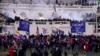 FILE - Violent rioters loyal to President Donald Trump storm the Capitol in Washington on Jan. 6, 2021. 