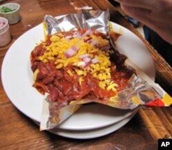 Somewhere, buried beneath the glop are the Fritos in this Frito Pie.