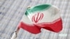 The Iranian flag flutters in front the International Atomic Energy Agency (IAEA) headquarters in Vienna, Austria, July 10, 2019.