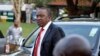 Presidential candidate Uhuru Kenyatta arrives to take part in a televised debate between presidential contenders, in Nairobi, Kenya, Feb. 11, 2013. 