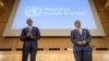 Rwandan President Paul Kagame (L) and World Health Organization (WHO) Director-General Tedros Adhanom Ghebreyesus attends the opening day of the World Health Assembly, an annual meeting with health representatives to discuss a range of global health issues, on May 21, 2018 in Geneva. 