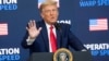 FILE - U.S. President Donald Trump speaks in the Eisenhower Executive Office Building adjacent to the White House in Washington, Dec. 8, 2020.