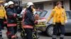 A wounded person is carried on a stretcher to an ambulance by firefighters and medics, after an explosion at the entrance of the U.S. Embassy in Ankara February 1, 2013. A suicide bomber killed a Turkish security guard at the U.S. embassy in Ankara on Fri