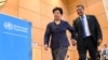 Outgoing Director-general of the World Health Organization (WHO), China's Margaret Chan (L), leads new WHO Director-general, Ethiopia's Tedros Adhanom Ghebreyesus, to the podium after his election during the World Health Assembly (WHA) in Geneva, Switzerland, May 23, 2017.