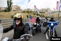 Motocilistas del club israelí Samson Riders celebran en las calles de Jerusalén.