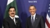 U.S. President Barack Obama (R) shakes hands with Pakistan's Prime Minister Yusuf Raza Gilani during their bilateral meeting on the sidelines of the Nuclear Security Summit in Seoul, March 27, 2012.