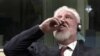 Slobodan Praljak, nakon potvrđivanja osuđujuće presude i kazne zatvora od 20 godina, pije tečnost za koju njegova advokatica tvrdi da je otrov, u Haškom tribunalu, Holandija, 29. novembra 2017.