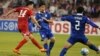 19일 카타르 도하 알 아라비 스포츠 클럽에서 열린 2016 아시아축구연맹 U-23 챔피언십 B조 예선 마지막 경기인 북한 대 태국 경기에서 북한 윤일광 선수(빨간 유니폼)가 슛을 시도하고 있다. 