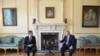 Britain's Prime Minister Boris Johnson, right, and U.S. Secretary of State Antony Blinken meet inside 10 Downing Street in London, May 4, 2021.