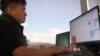 French police secure the area as the investigation continues at the scene near the heavy truck that ran into a crowd at high speed killing scores who were celebrating the Bastille Day July 14 national holiday on the Promenade des Anglais in Nice, France, 