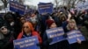 Trump administration lays off probationary employees, plans 'large-scale' cuts