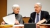 Paulo Pinheiro, Chairperson of the Commission of Inquiry on Syria, arrives with Karen Abuzayd, member of the Commission before the launch of their report on sexual and gender-based violence in Syria at the UN office in Geneva, March 15, 2018. 