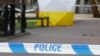 FILE - A police tent covers the spot in Salisbury, Britain, March 6, 2018, where former Russian double agent Sergei Skripal and his daughter Yulia were found critically ill following, as was later determined, their exposure to Soviet-era nerve agent Novichok.