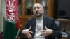 FILE - Afghan National Security Adviser Mohammad Hanif Atmar speaks during an interview with The Associated Press, in Kabul, Afghanistan.