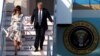 U.S. President Donald Trump and first lady Melania Trump arrive aboard Air Force One at Tokyo Haneda Airport in Tokyo, May 25, 2019. 