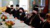 Vaseljenski partrijar Vartolomej I, u centru, uz duhovne lidere pravoslavnih hrišćana sveta, govori tokom sasatanka sa državnim sekretarom SAD Entonijem Blinkenom, u Stejt departmentu u Vašingtonu, 25. oktobra 2021.