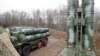 FILE - Russian S-400 surface-to-air missile systems are shown after their deployment at a military base outside the town of Gvardeysk, near Kaliningrad, Russia, March 11, 2019. 