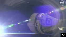 La cápsula Starliner vista desde la EEI poco antes de su acoplamiento, el 6 de junio de 2024.