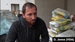 Construction worker Taner Mutlu unpaid for months and struggling to pay his rent and feed his family, is occupying the luxury apartment project he is working on.