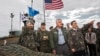 South Korean Defense Minister Kim Kwan-jin (R) points out a location in North Korea to U.S. Secretary of Defense Chuck Hagel, from Observation Point Ouellette during a tour of the Demilitarized Zone (DMZ), South Korea September 30, 2013. 
