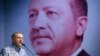 Turkey's President and leader of ruling Justice and Development Party Recep Tayyip Erdogan addresses his party members in Istanbul, June 25, 2017.