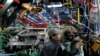 FILE - A worker checks a new assembly line at the Ford Hai Duong production facility in Hai Duong, Vietnam.